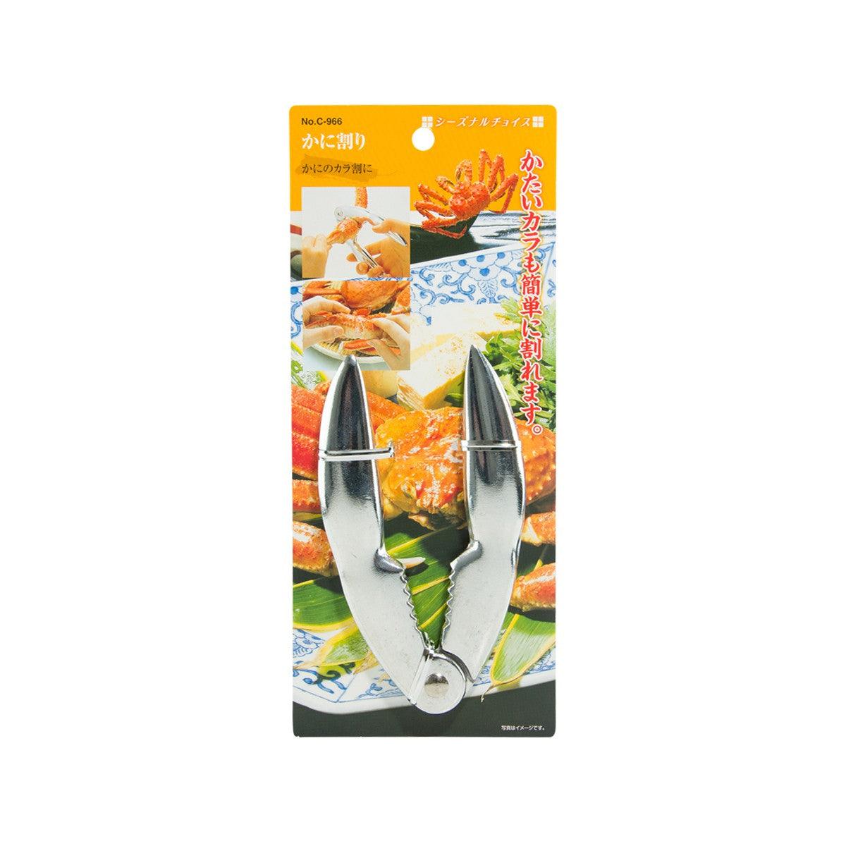 Metal crab cracker with hinged claws and bottle-opener tail, silver finish