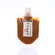 Miso with sake lees pouch (200g), amber liquid, front label