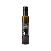 Citrus EVOO dressing bottle with black cap and front label