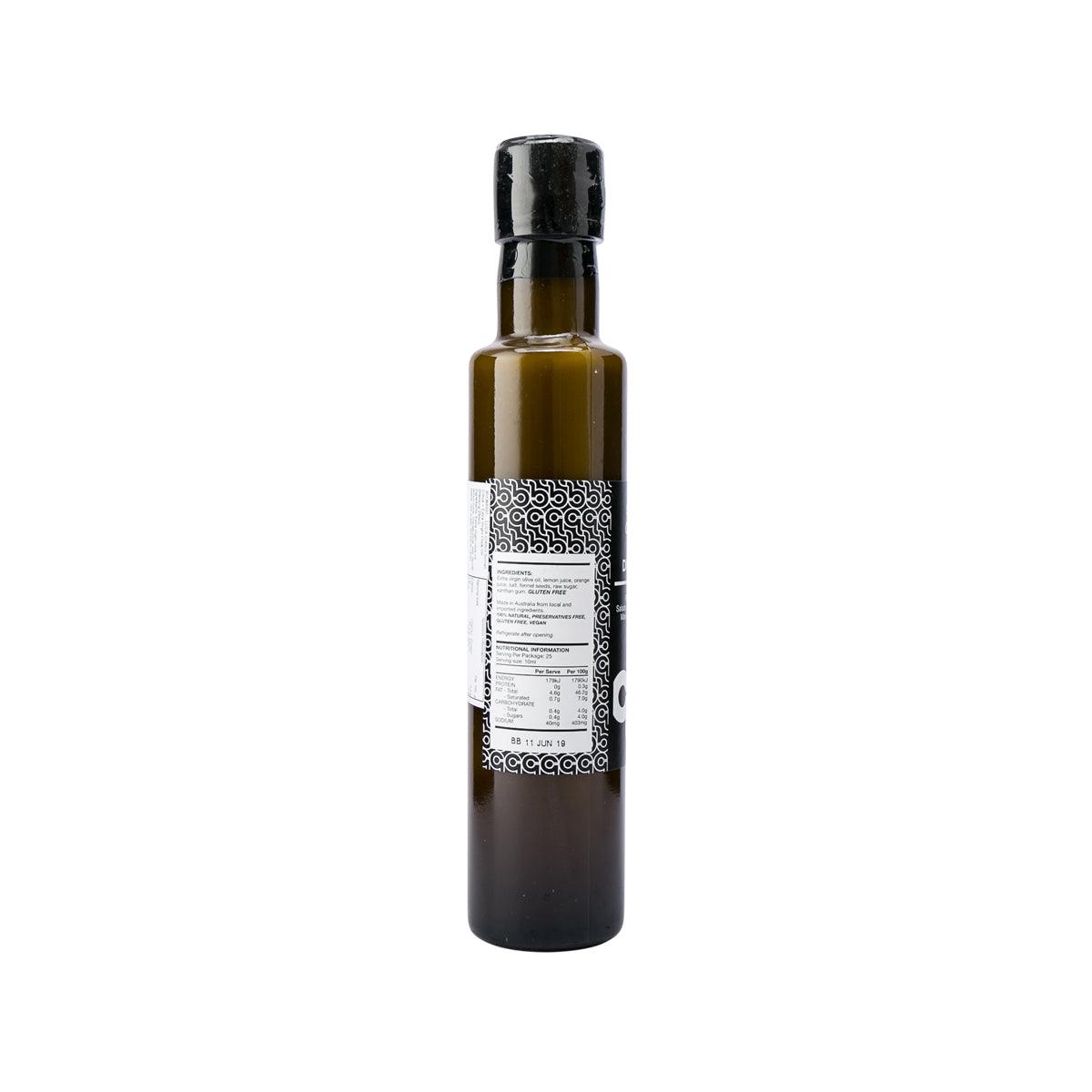 Citrus EVOO dressing bottle with black cap and patterned side label