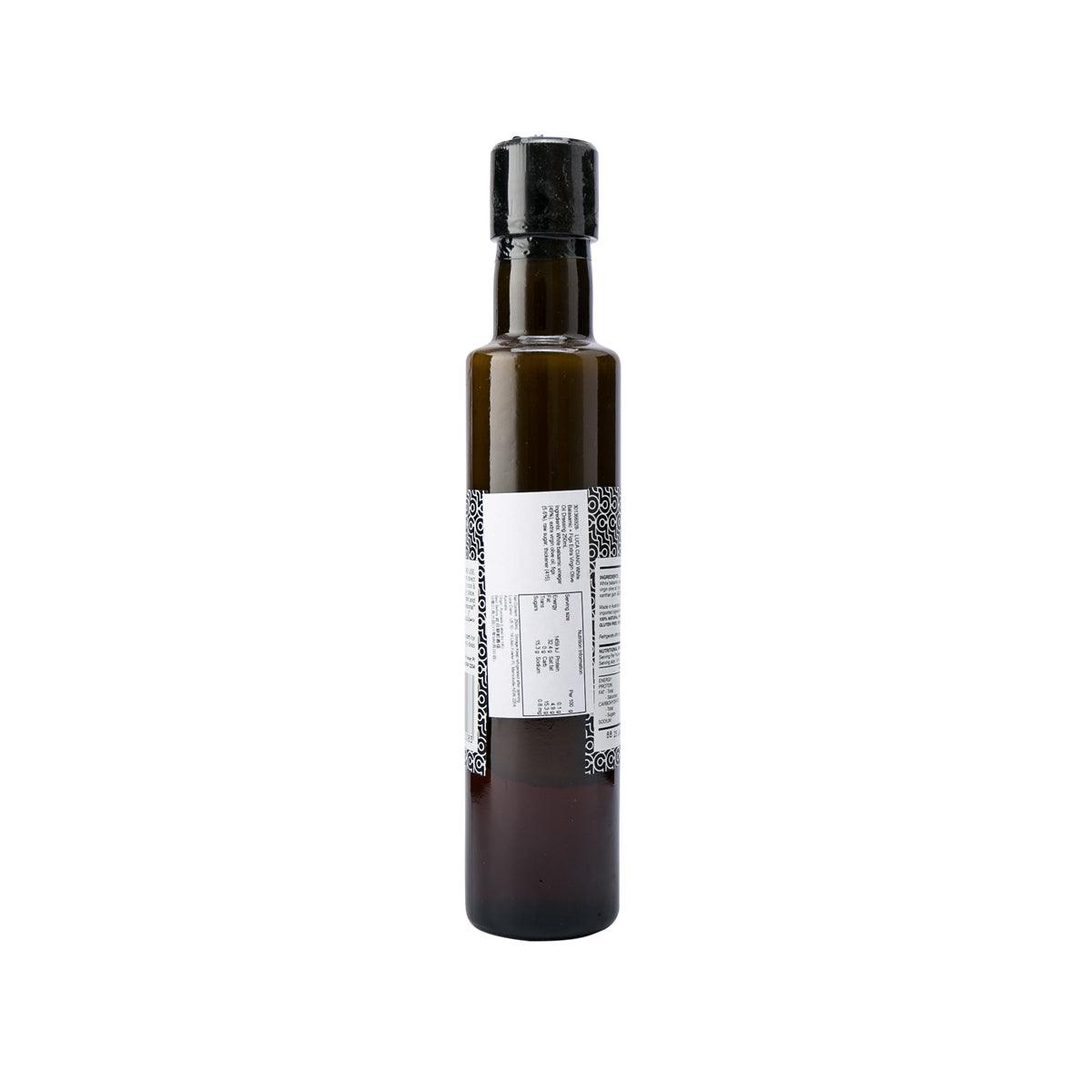 LUCA CIANO dressing bottle with black cap, back label text visible