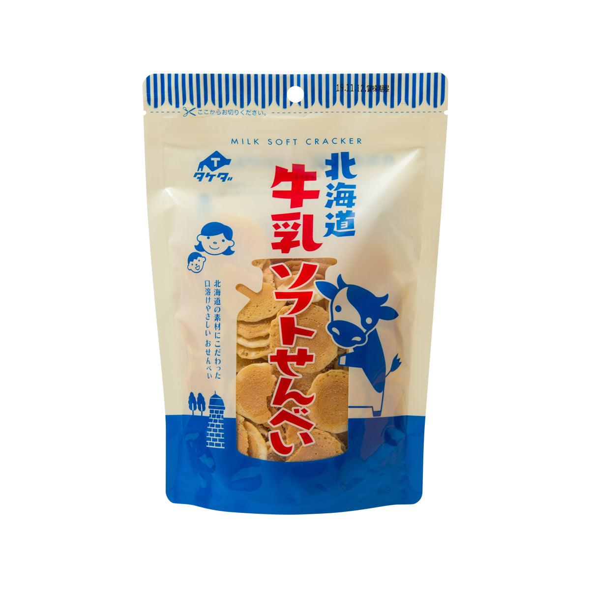 Milk soft wheat cracker pouch, blue and white with printed seal and graphics.