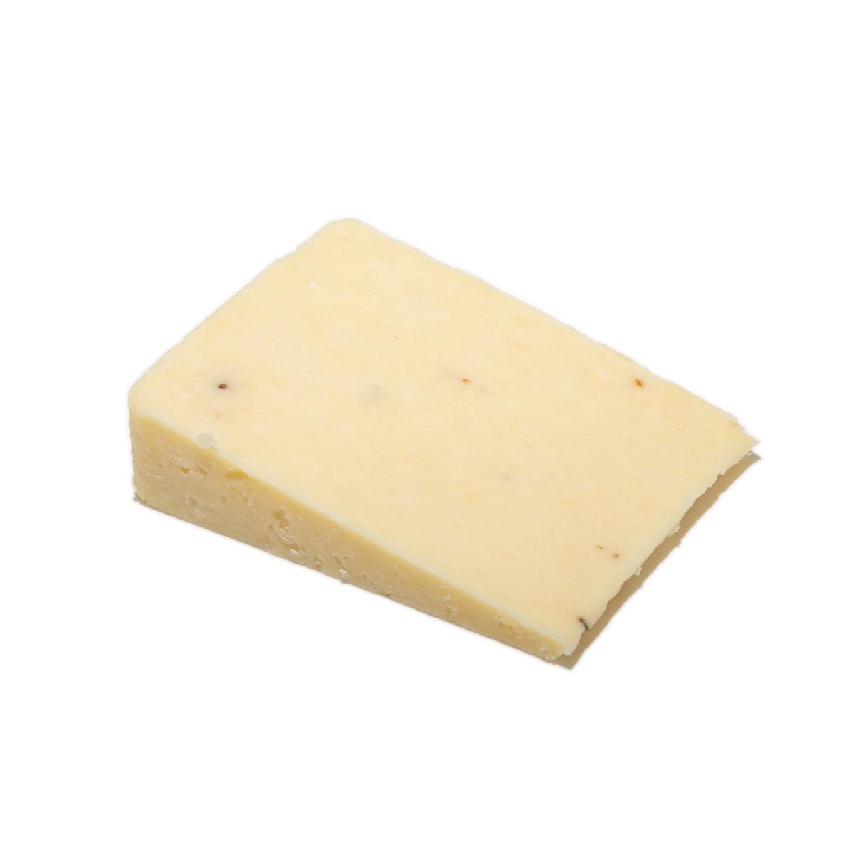 Paxton & Whitfield truffle cheese wedge, pale yellow