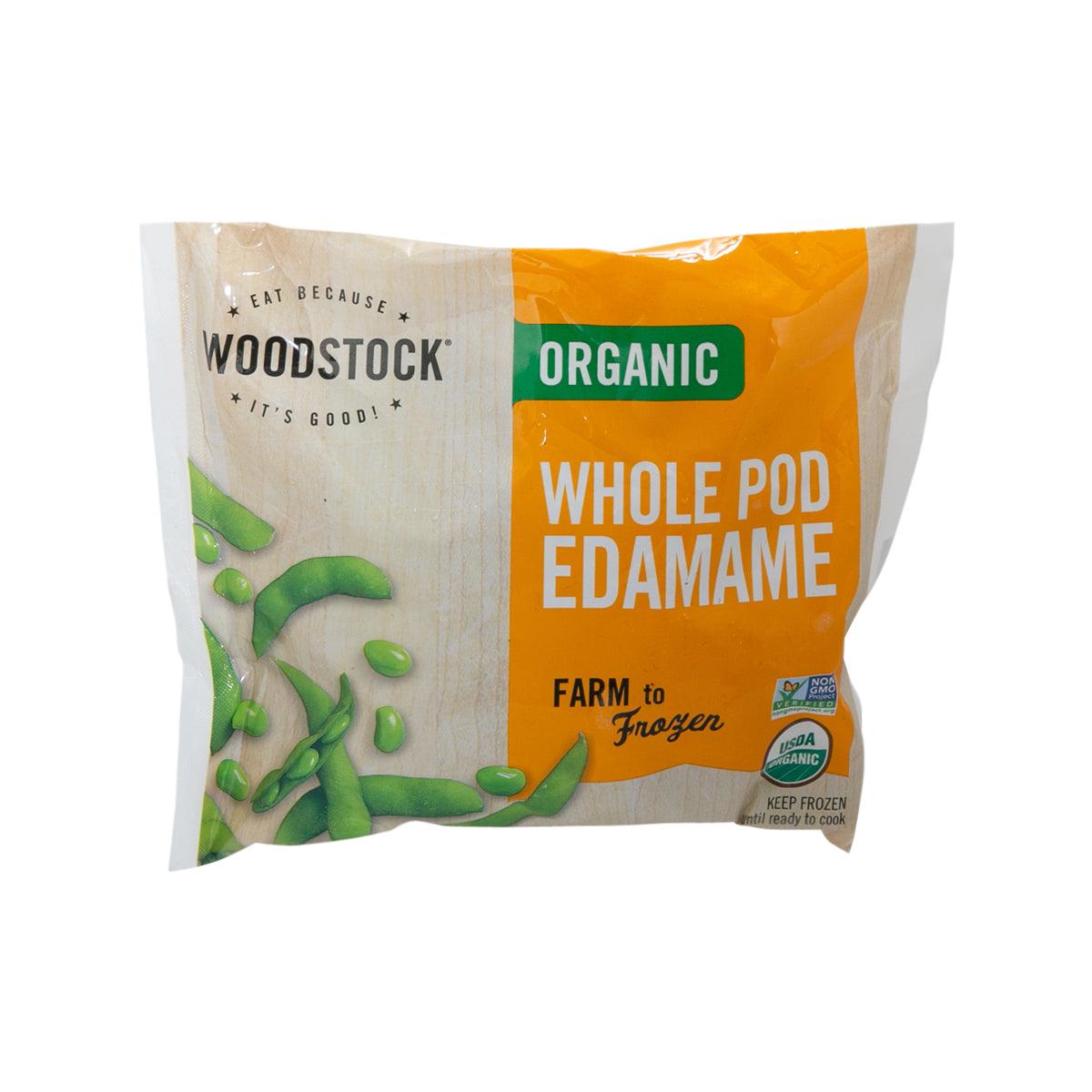 Organic whole pod edamame pouch, orange and white front with green bean pods