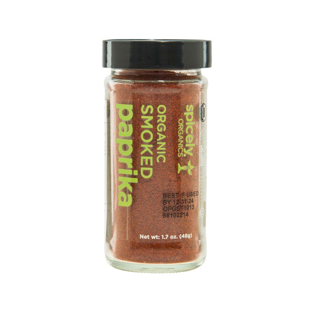 Glass jar of red-brown smoked paprika with dark screw-top lid