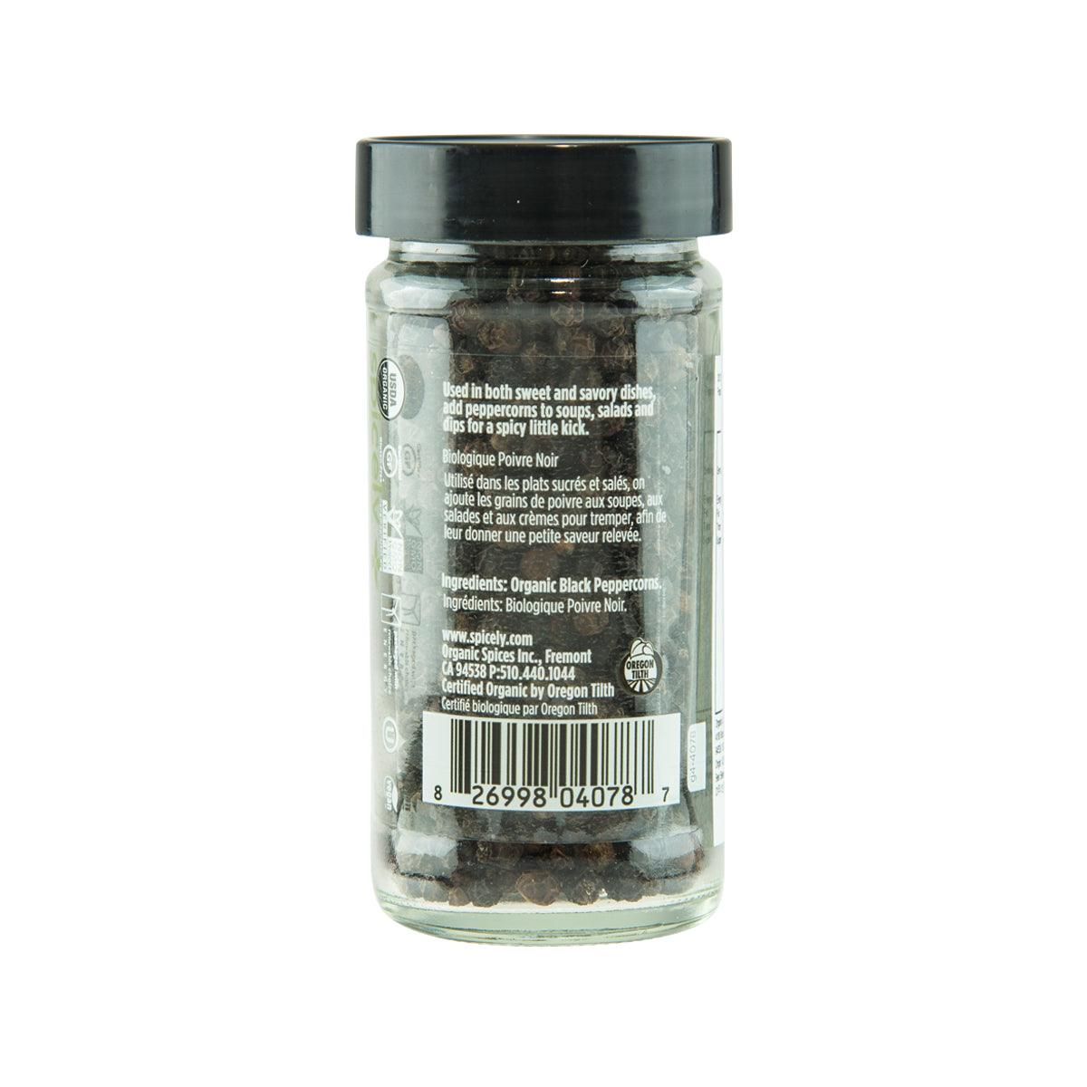 SPICELY organic black peppercorns jar back label, ingredients and barcode on clear bottle.