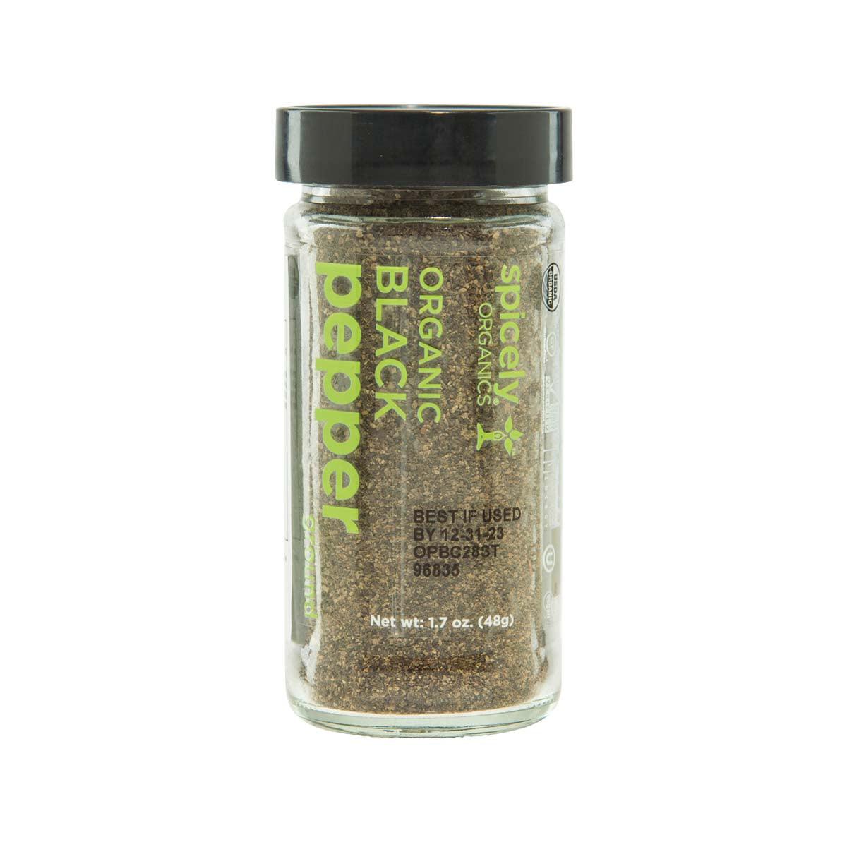 SPICELY organic ground black pepper jar, 48 g; glass container with dark pepper.