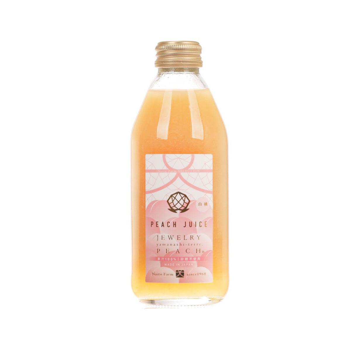 Peach nectar bottle, clear glass with orange liquid and peach label, 250 mL
