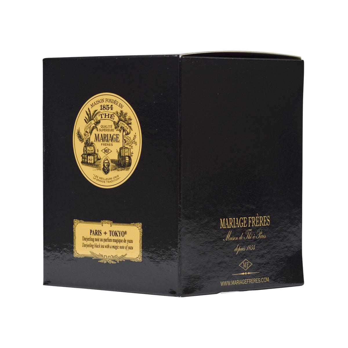 Black tea box with yuzu branding on front and side panels, 100 g