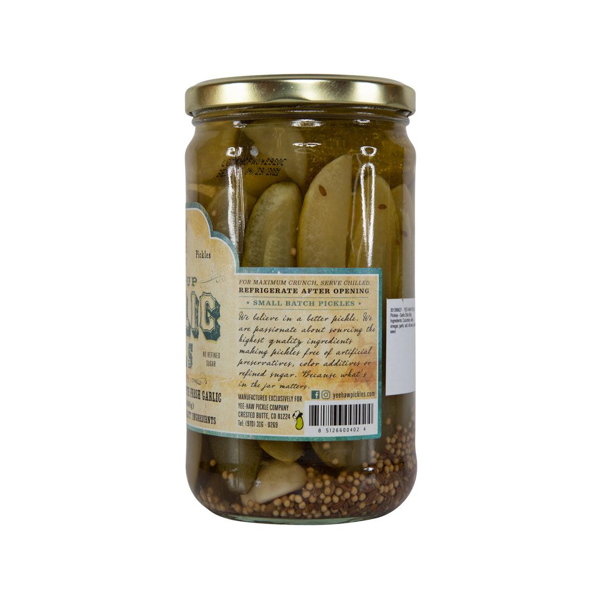 Back view of jar of garlic dill pickles with nutrition and ingredients label