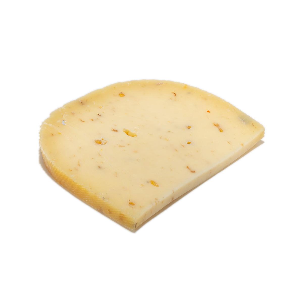 Truffle & mushroom cheese wedge, pale yellow with specks (150 g)