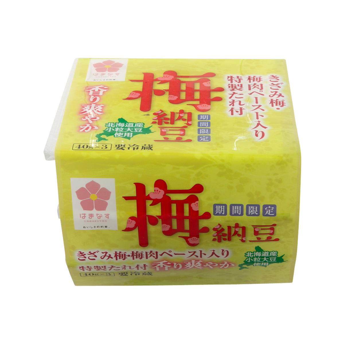 Plum natto seasoning pack, angled side view in yellow-green with red branding