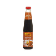LEE KUM KEE Chinese marinade bottle with red cap and dark brown sauce