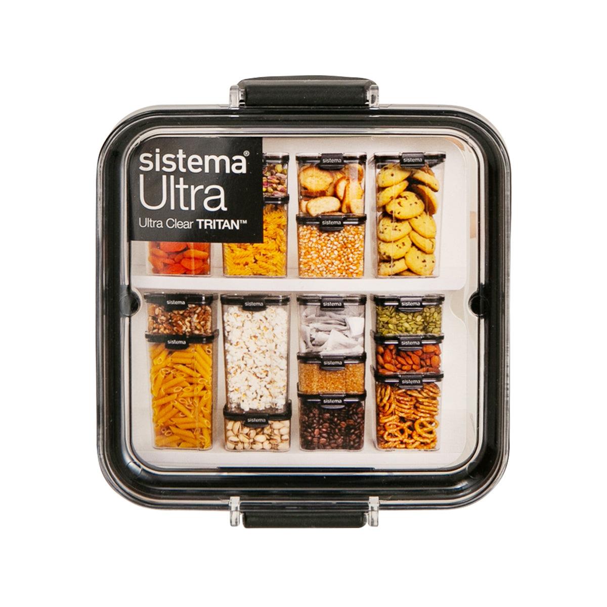 Square clear plastic food container with black lid, showing divided storage compartments