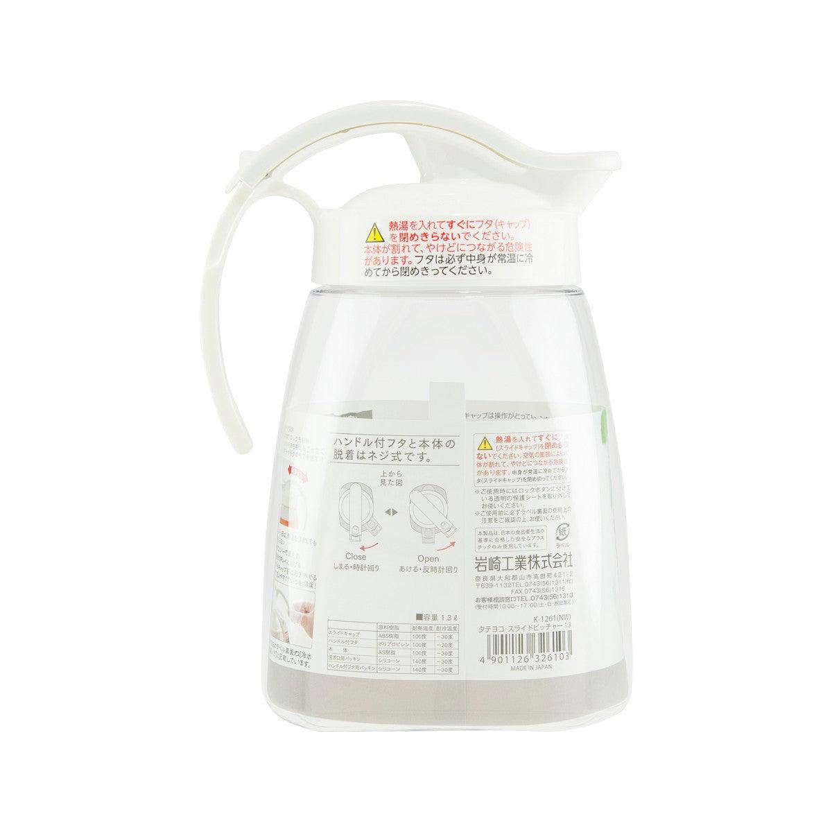 LUSTROWARE 1.3L water pitcher, clear plastic with spout, handle, and back label