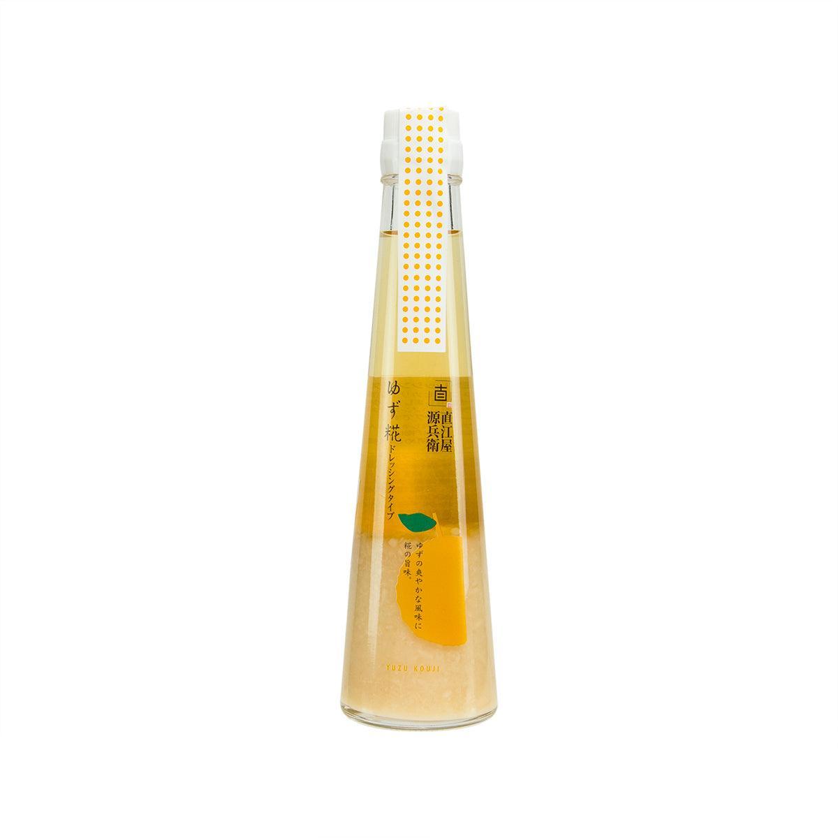 NAOGEN dressing bottle with white cap, clear glass, yellow liquid