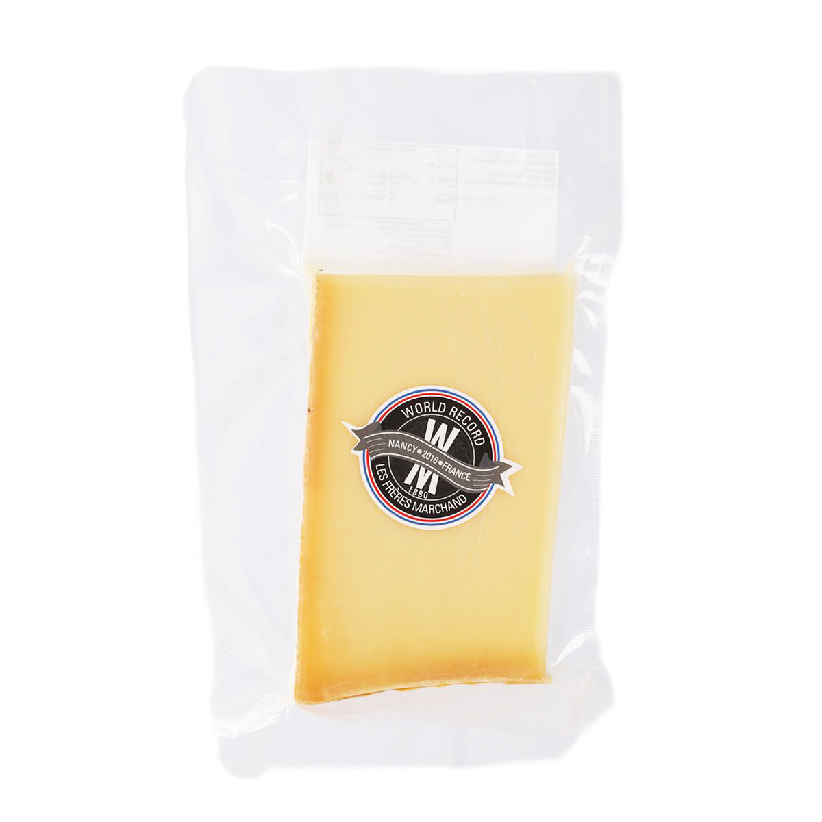 Beaufort cheese wedge in clear vacuum-sealed pouch, round brand logo on center
