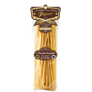 Artisanal bucatini pasta 500g, long ridged hollow strands in clear bag.