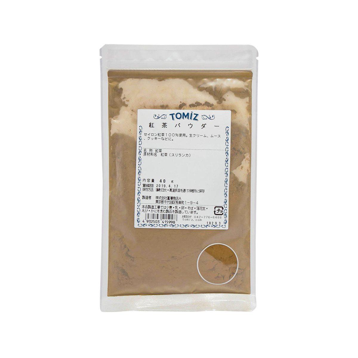 TOMIZAWA black tea powder 40g pouch with front label, light brown powder inside.