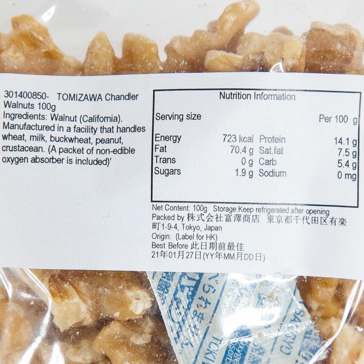 Chandler walnuts close-up with nutrition panel on pouch backing