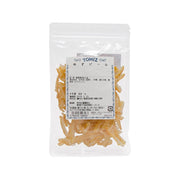 Candied yuzu citrus peel in clear resealable pouch, shredded amber peel pieces