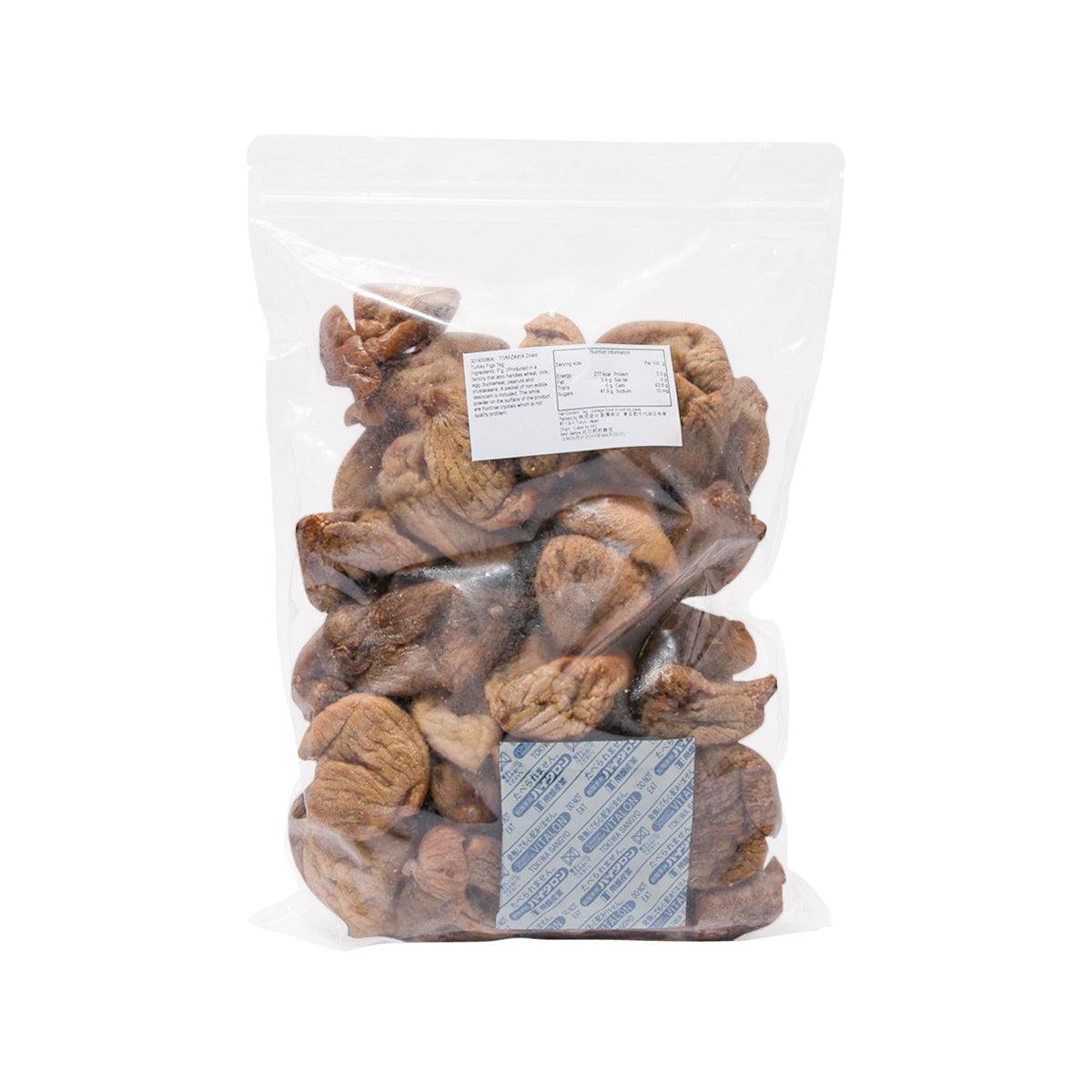 Dried Turkish figs sealed in plastic bag, dark brown fig pieces with labels.