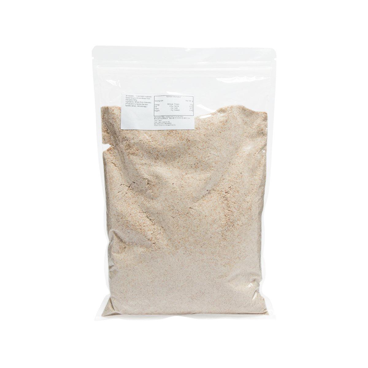 Stone-ground whole wheat flour pouch, 500 g, rear label visible