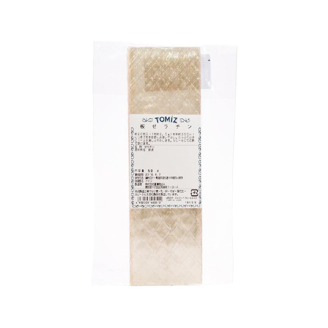 TOMIZAWA gelatin sheet, translucent beige sheets in sealed pouch with label