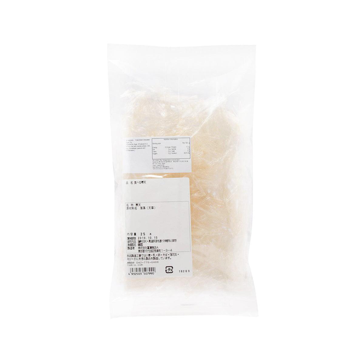 Shredded agar flakes in sealed clear pouch with label, pale beige
