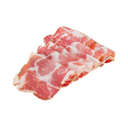 Cured coppa ham slices, red pork with white fat marbling stack