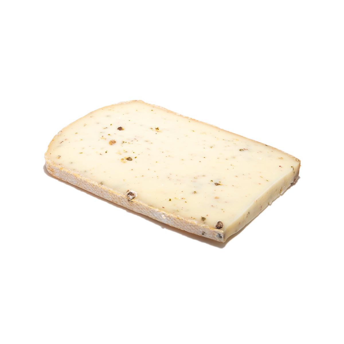 LES FRERES MARCHAND raclette cheese wedge with green and pink pepper specks