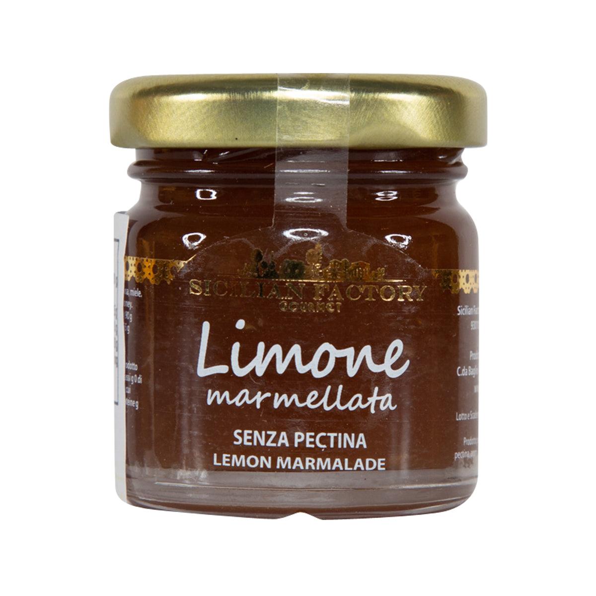 Lemon marmalade jar with gold lid and front label reading “Limone marmellata”