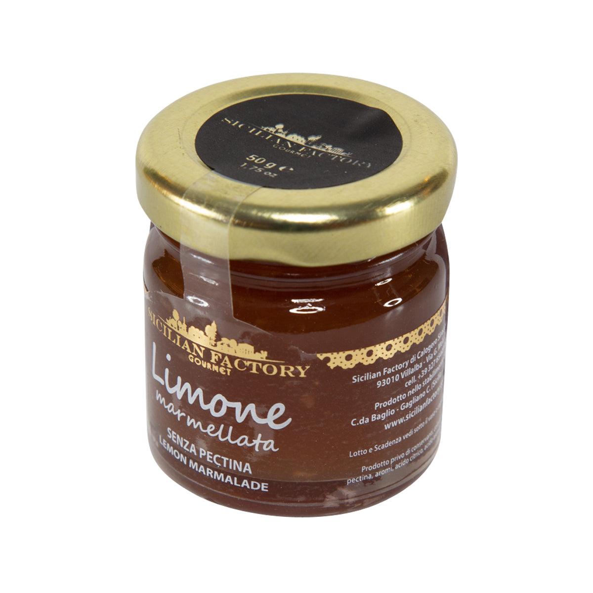 Lemon marmalade jar with gold lid, top label, and brown marmalade visible
