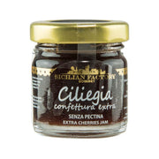 Extra cherry jam jar with gold lid and dark cherry label