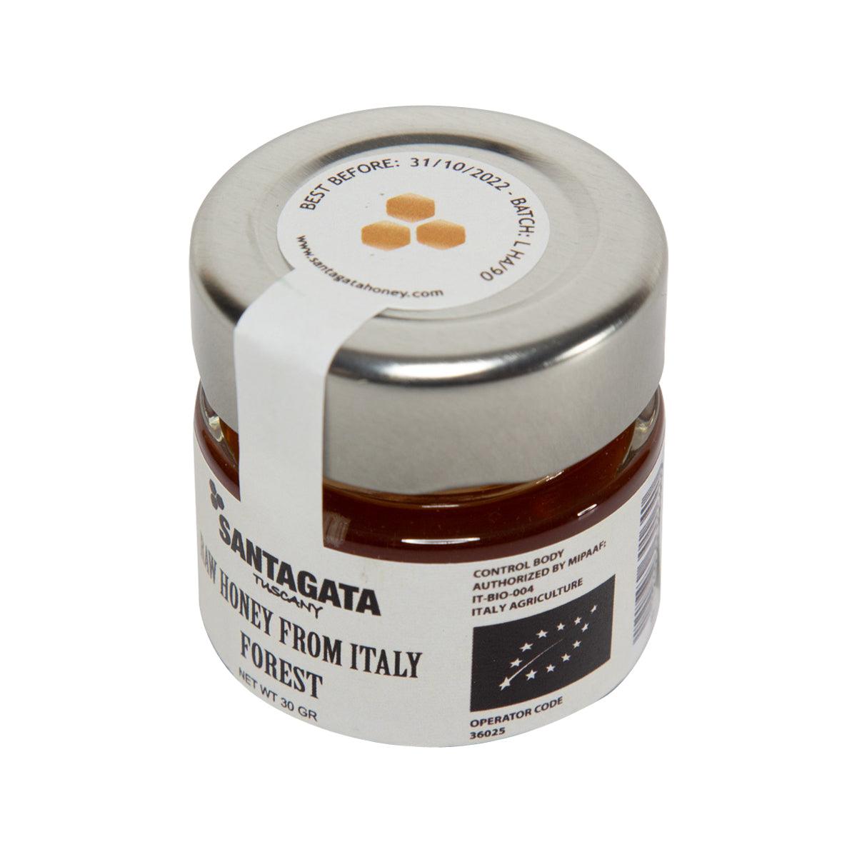 Organic raw forest honey jar with metal lid, amber honey visible, SANT' AGATA