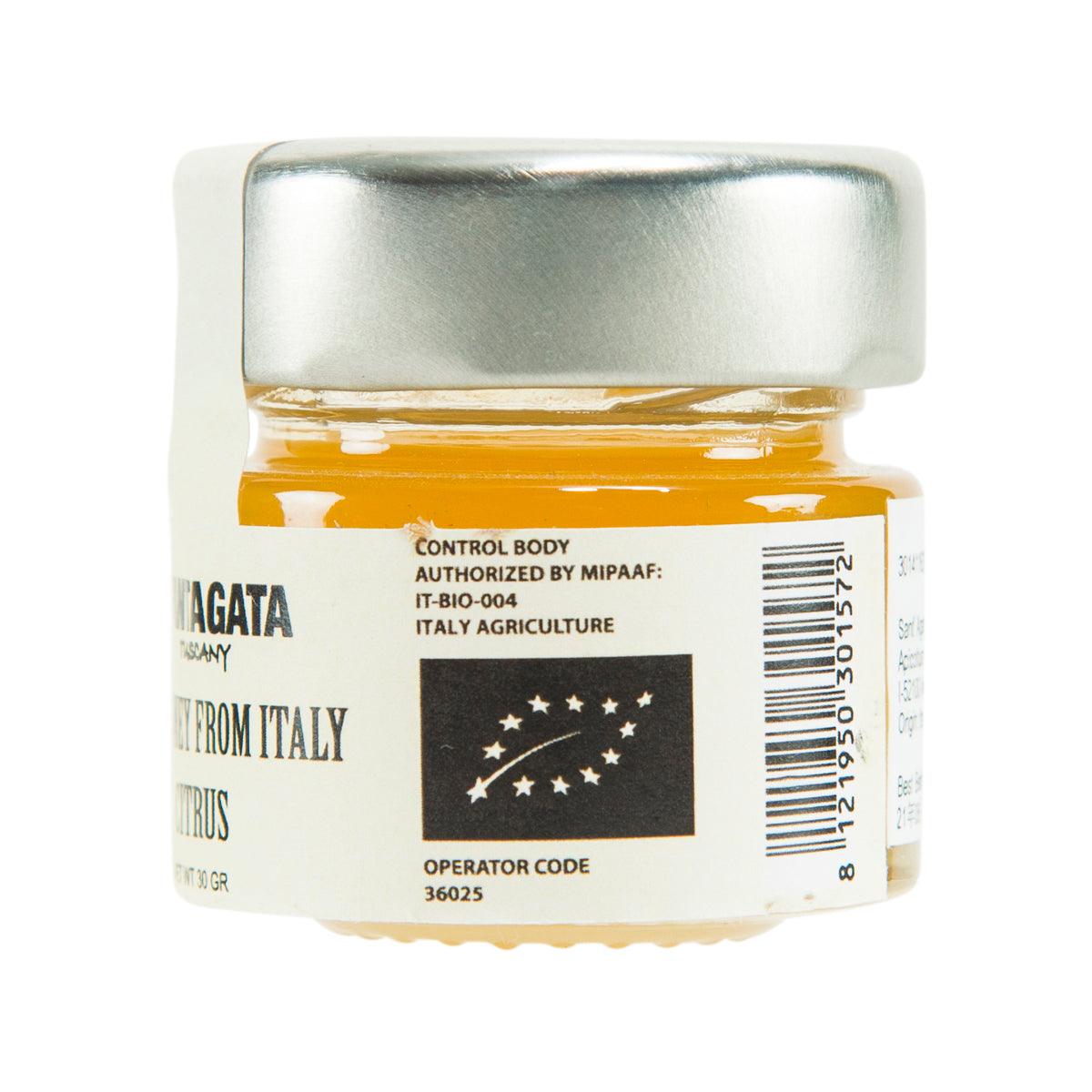 Raw citrus honey jar back label with barcode and metallic cap