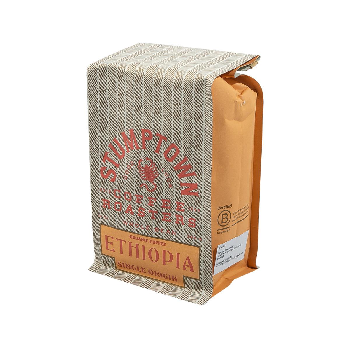 Whole coffee bean bag, side view with Ethiopia label and seal