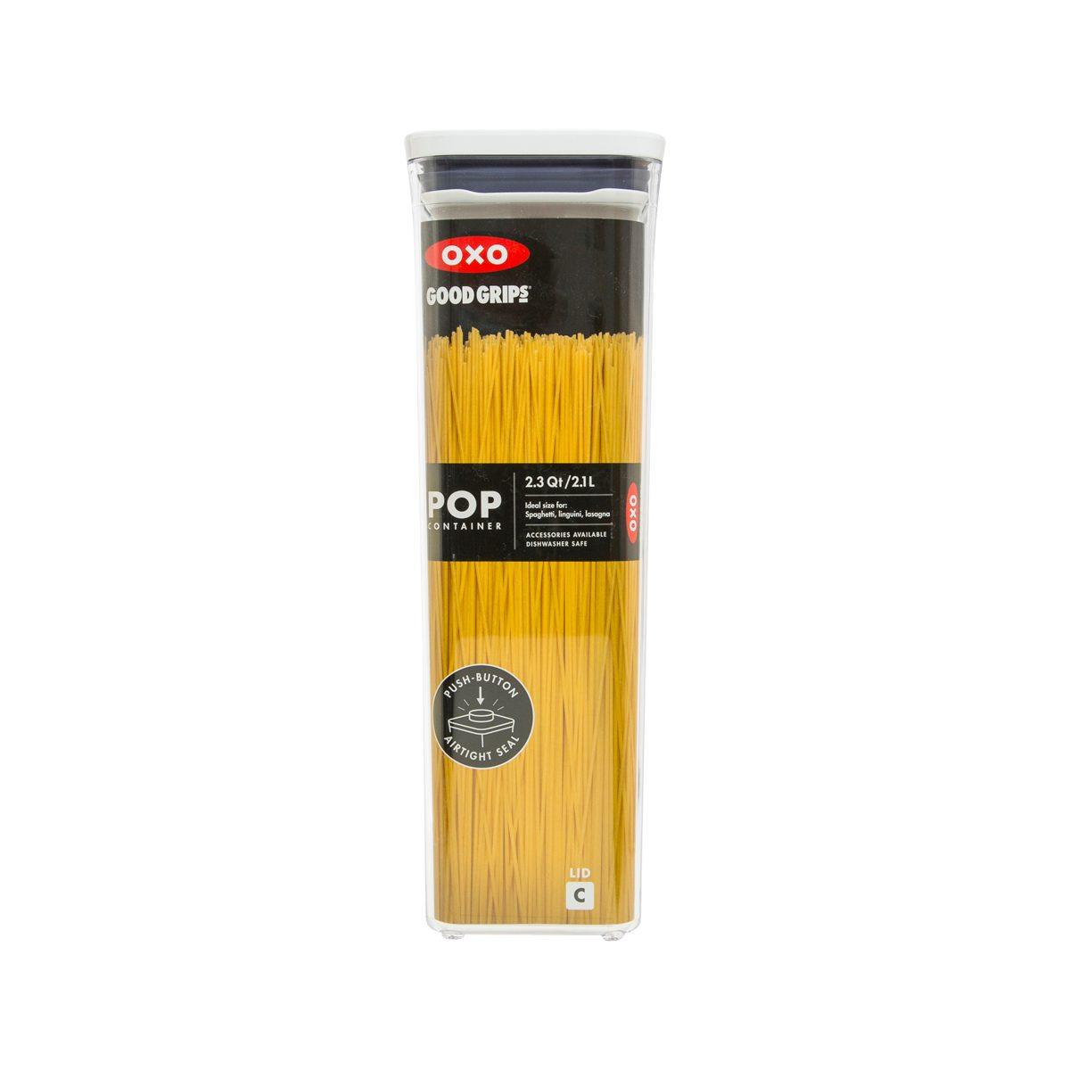 Small square OXO POP container with clear body, black label, and yellow spaghetti