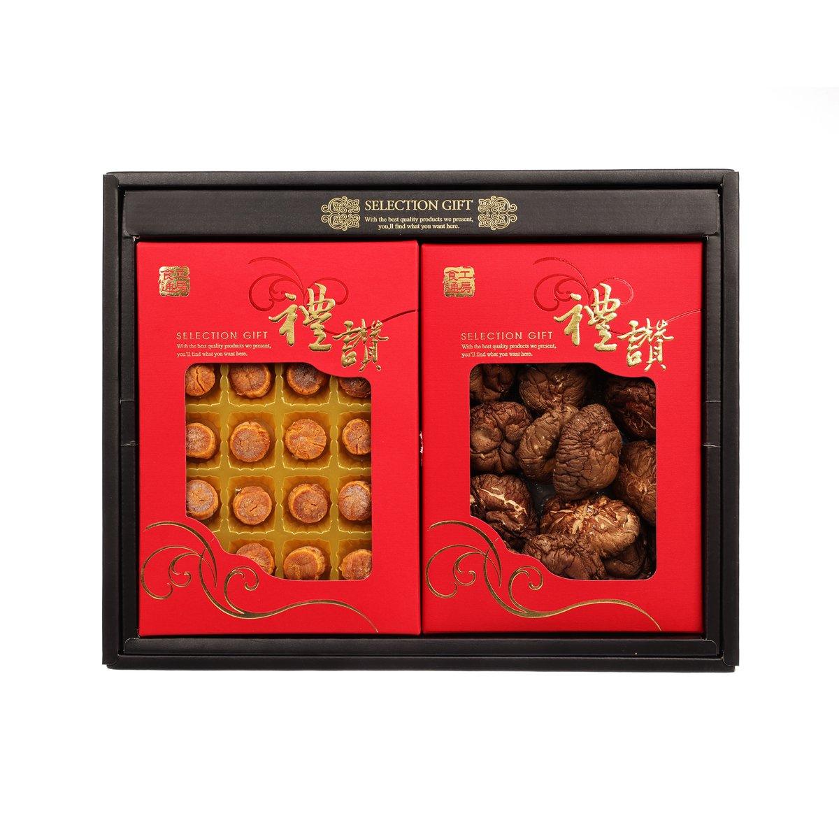 Selection gift set tray, open black box with two red compartments and assorted desserts