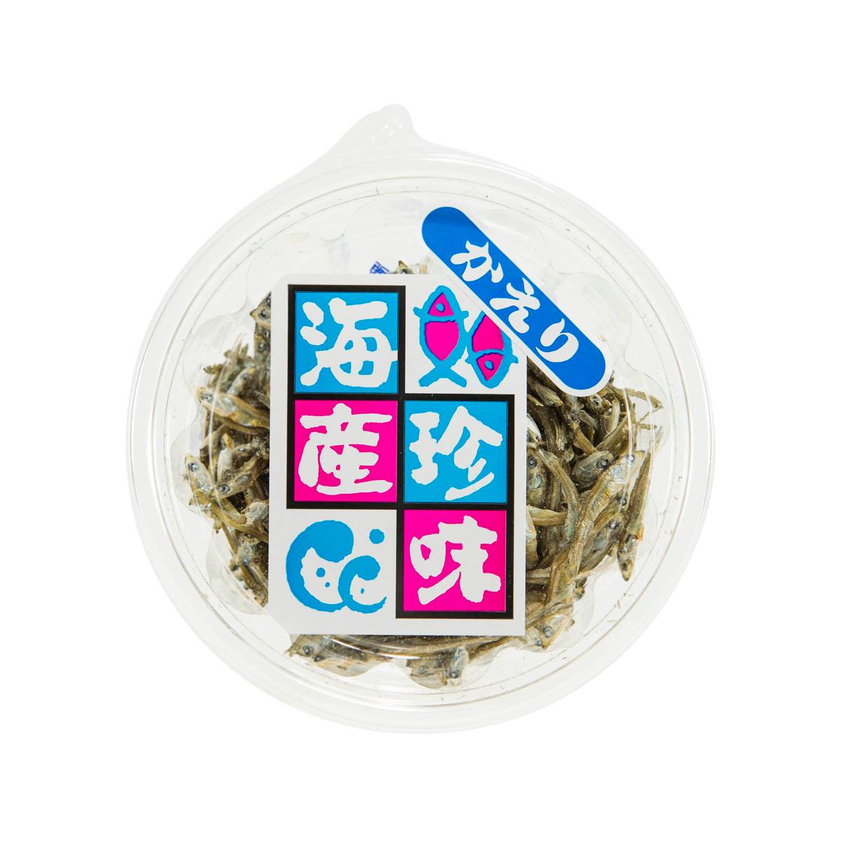 Clear plastic tub of dried Japanese anchovies with blue-and-pink label