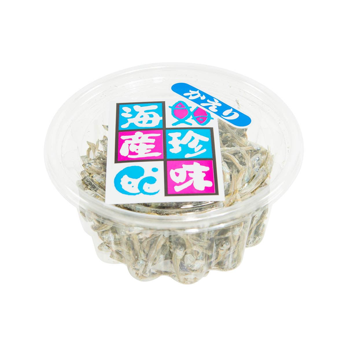 Clear plastic tub of dried Japanese anchovies with blue-and-pink square label