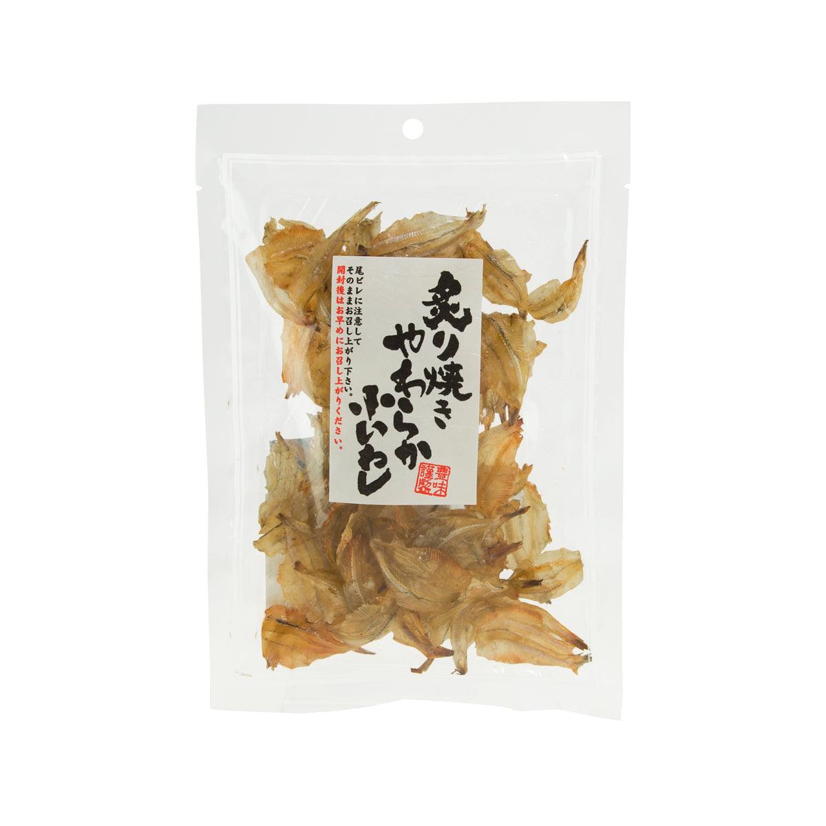 Grilled soft sardines in clear plastic pouch with front label, dried fish flakes