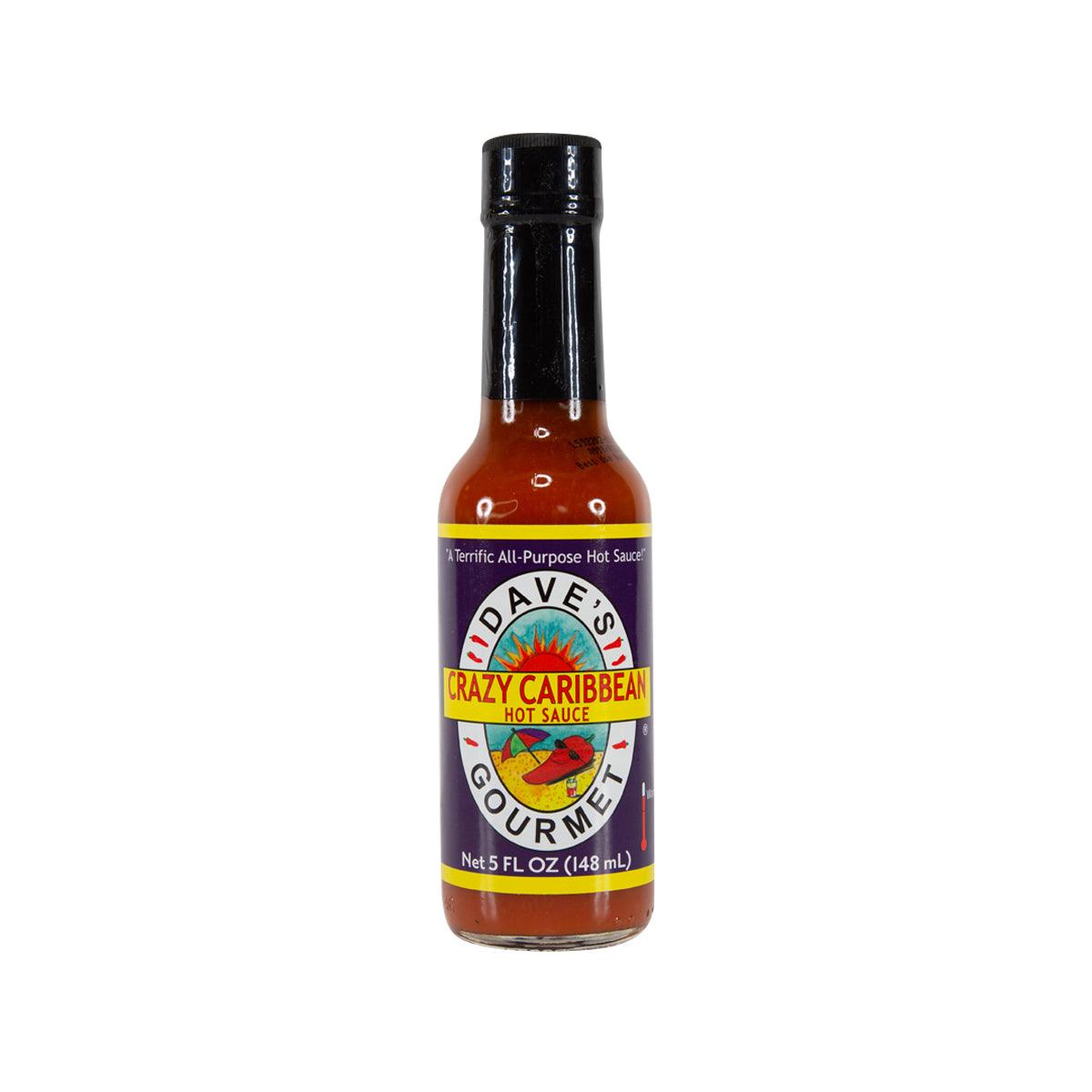 DAVE'S GOURMET Crazy Caribbean hot sauce bottle, amber sauce, front label view