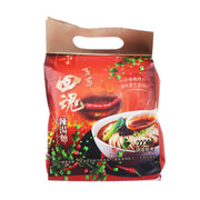 Spicy noodle soup mix packet with red artwork and chili toppings, front view