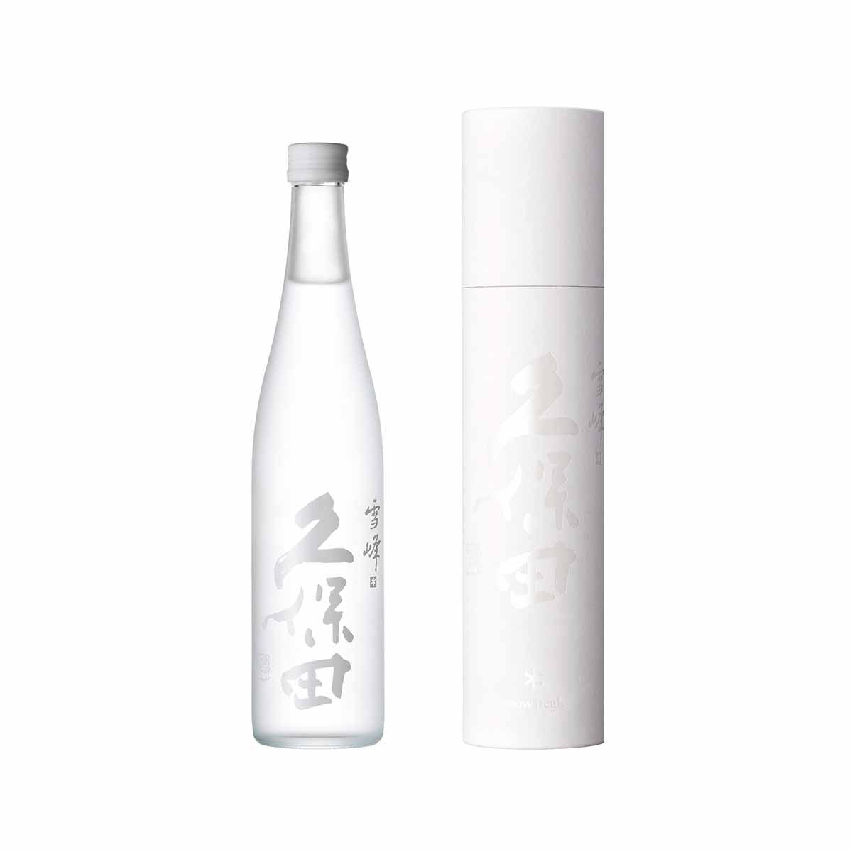 Junmai Daiginjo sake bottle with white cylindrical sleeve