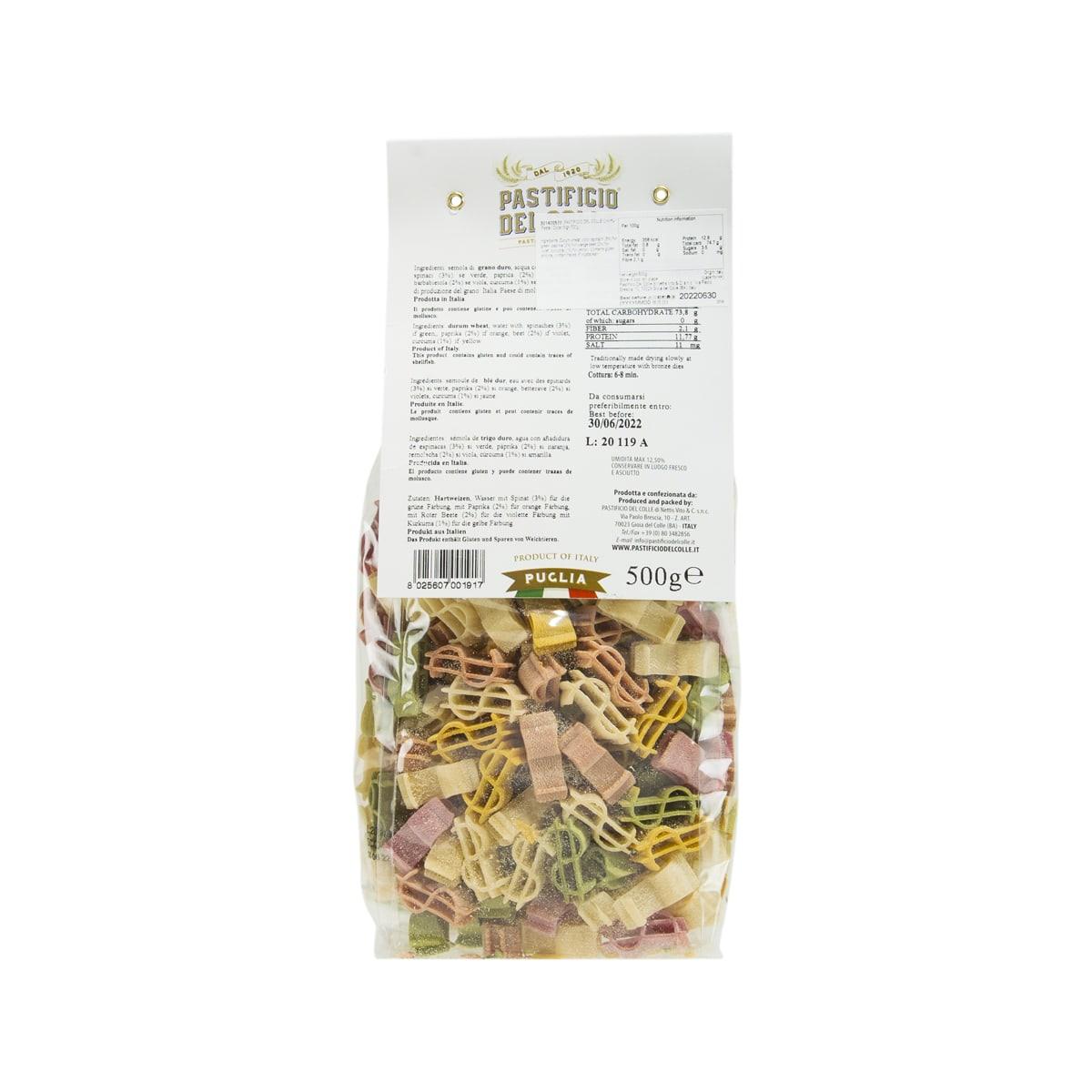 Back of 500 g pasta bag showing colorful dollar-sign pasta pieces and label