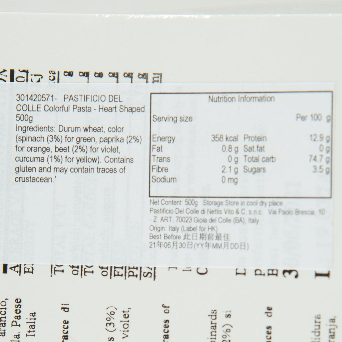 Heart-shaped colorful pasta label close-up with nutrition and ingredients text