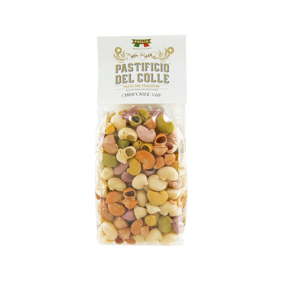 Colorful snail-shaped pasta in clear 500g bag with front label