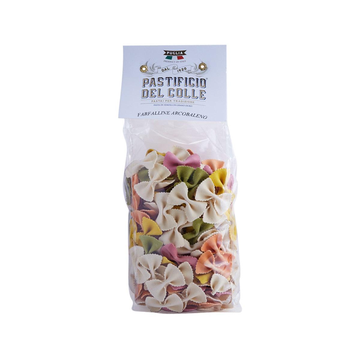 Colorful farfalle pasta in sealed bag with multicolor bow-tie shapes