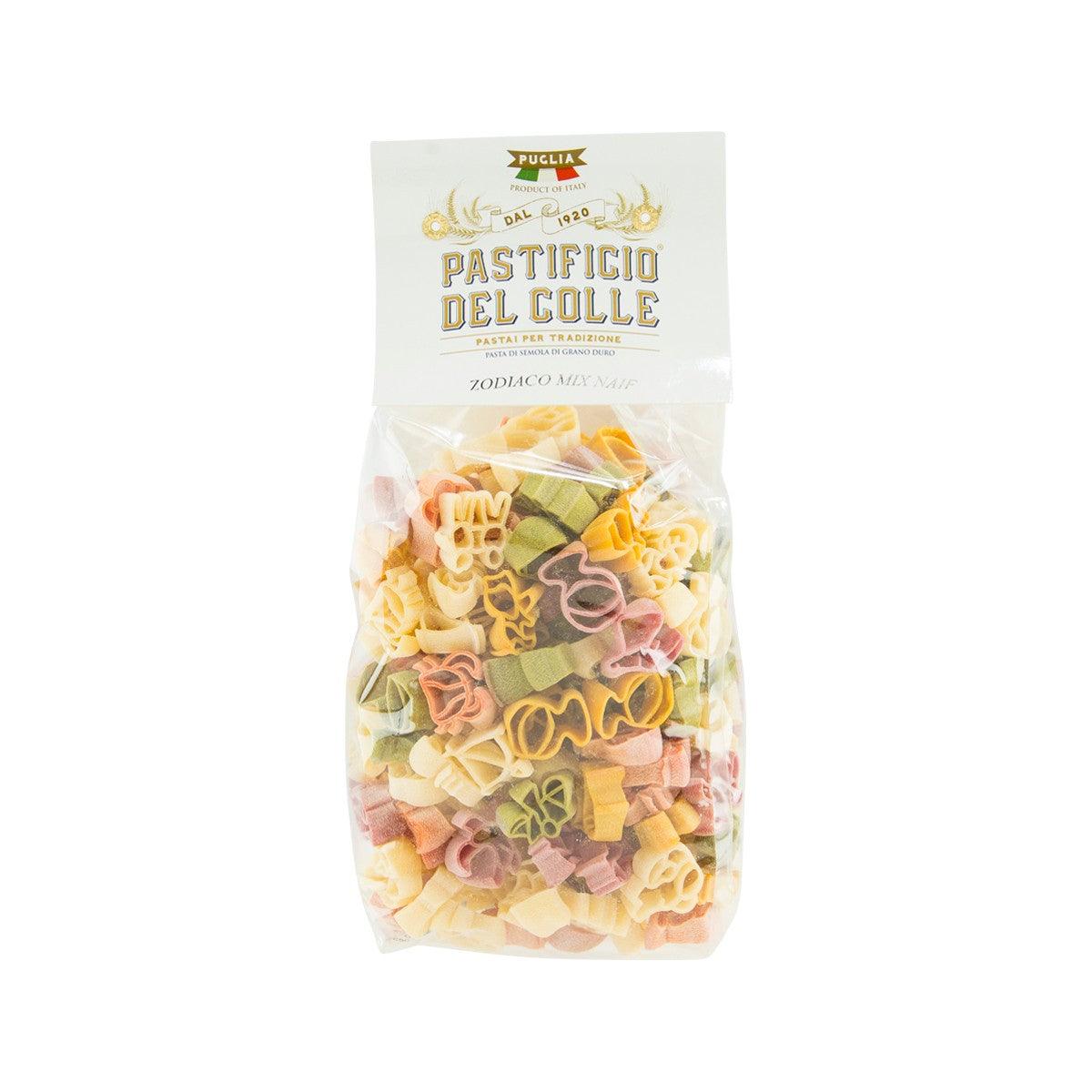 Colorful zodiac-shaped pasta in clear 500g bag, brand label on front